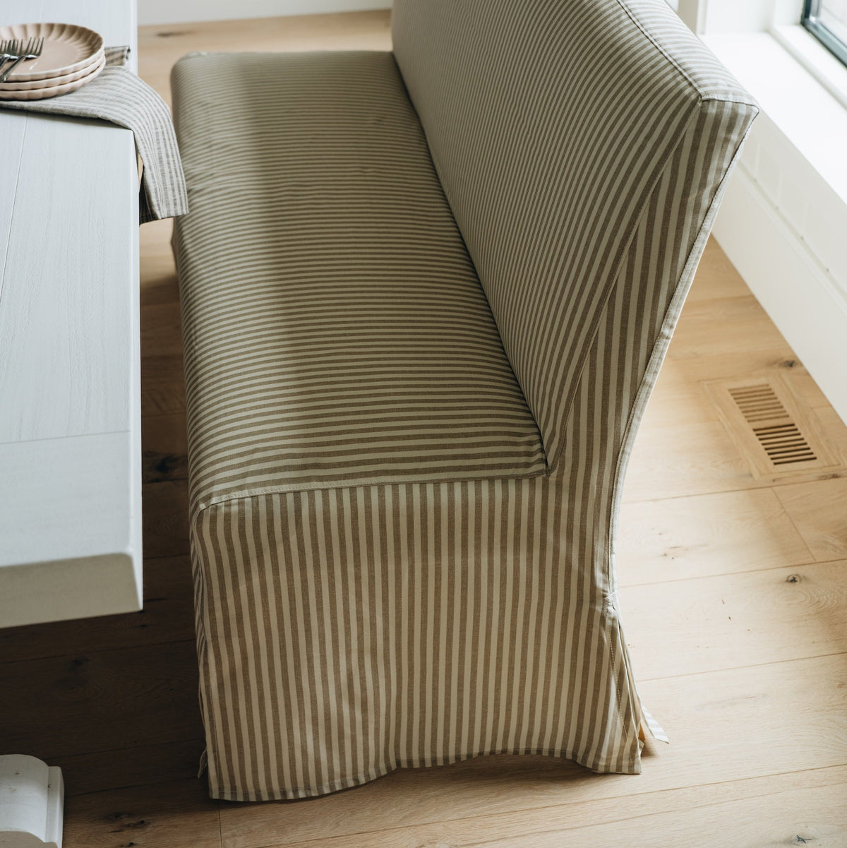 Lindy Slipcovered Dining Banquette in Jane Stripe Laurel