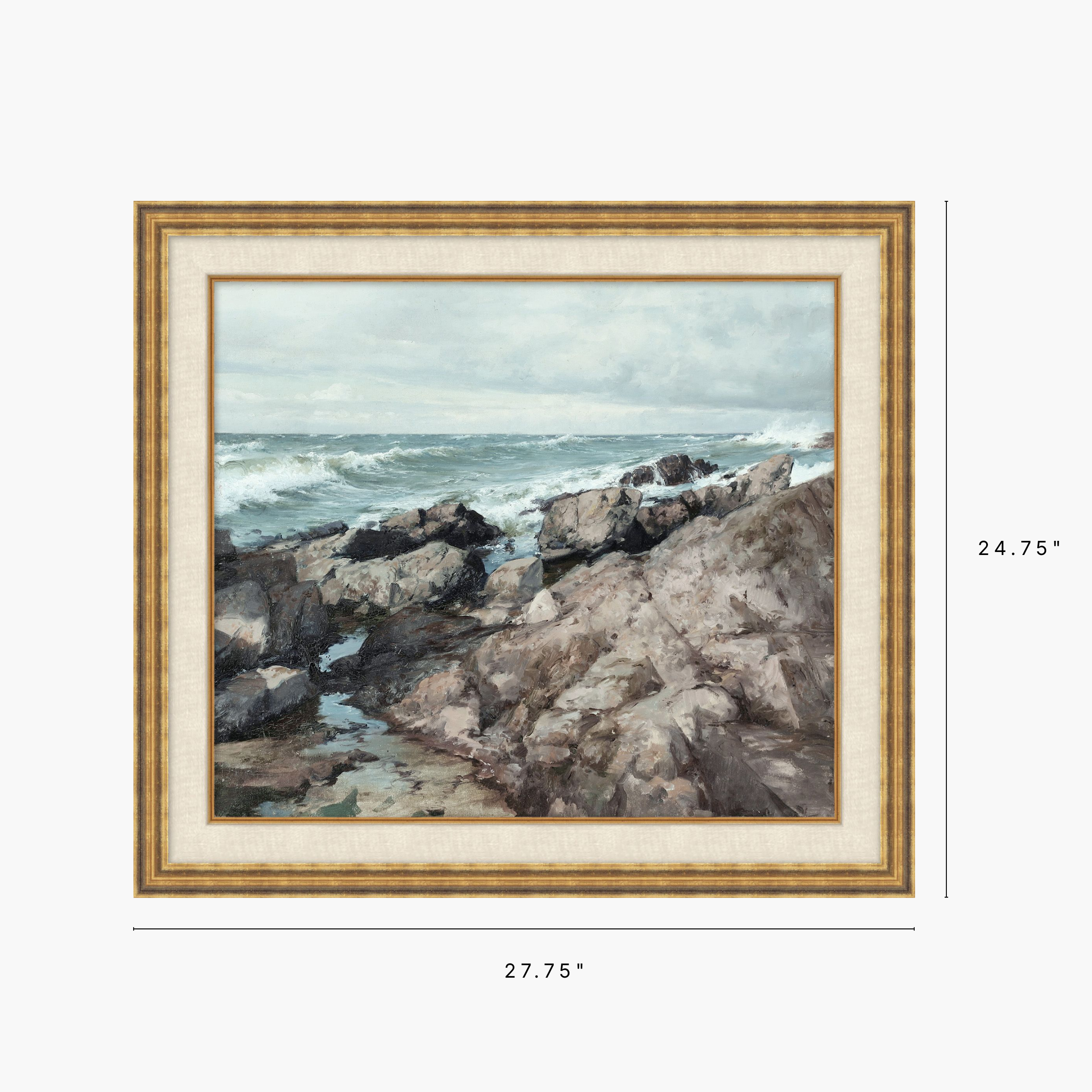 Framed landscape painting of a rocky coastline with ocean waves, shown with dimension markers indicating 27.75 inches wide by 24.