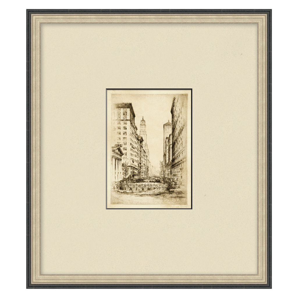 Framed black and white cityscape drawing on a beige background