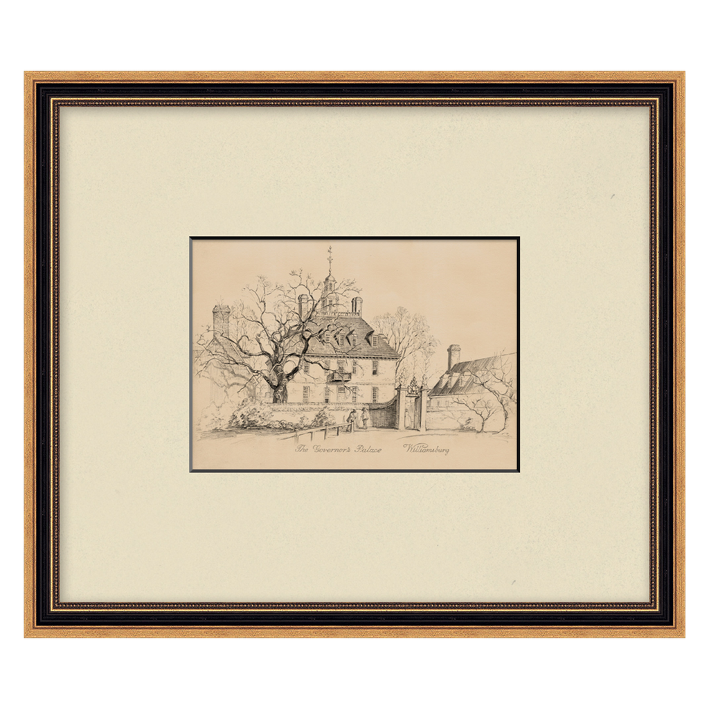 Framed black and white drawing of a house and tree on beige paper