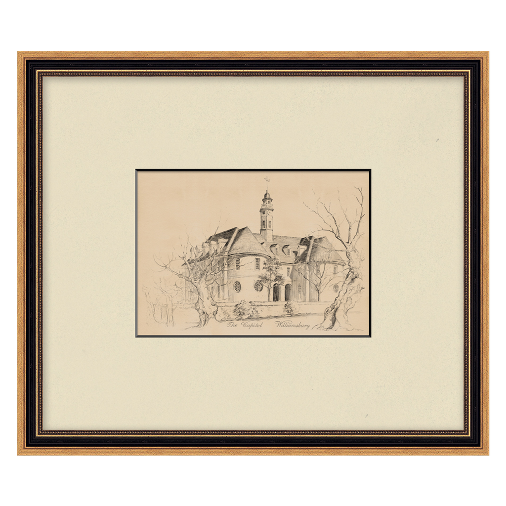 Framed black and white drawing of a building on beige paper