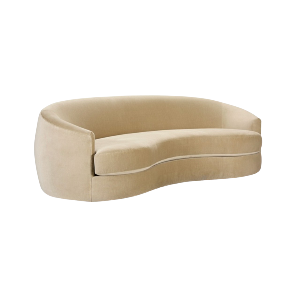 A modern curved upholstered sofa in a light beige fabric, shown from a three-quarter angle against a plain white background.